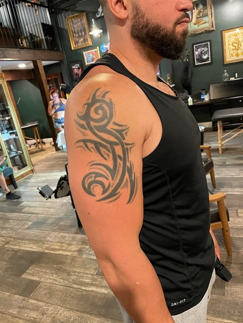 Stylish Upper Arm Tattoos for Men 3