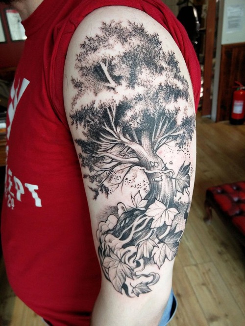 Unique Upper Arm Tattoos for Men 3