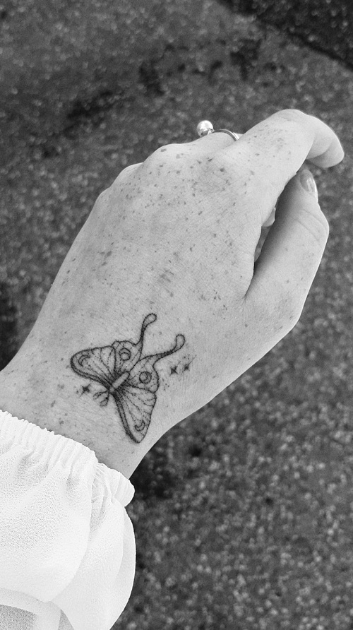 subtle Luna Moth Tattoo 