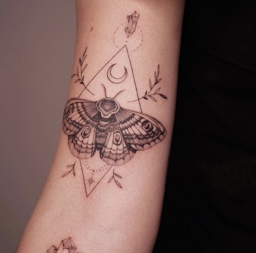 Luna Moth Tattoo with geometric shapes