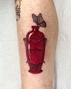 25 Red Ink Tattoo Ideas for a Clean, Monochrome Look - TattoosOfAsia