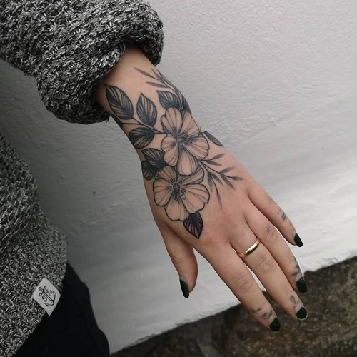 Trending hand tattoo idea 1