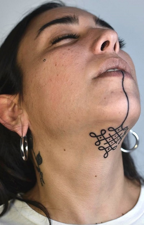 Stunning Under Chin Tattoo 5