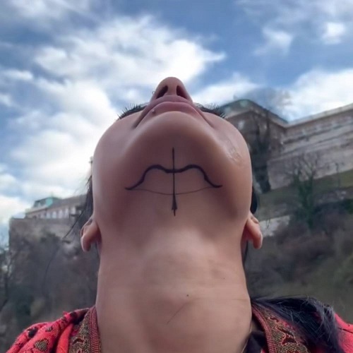 Women Under Chin Tattoo 3