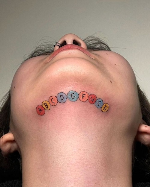 Women Under Chin Tattoo 5