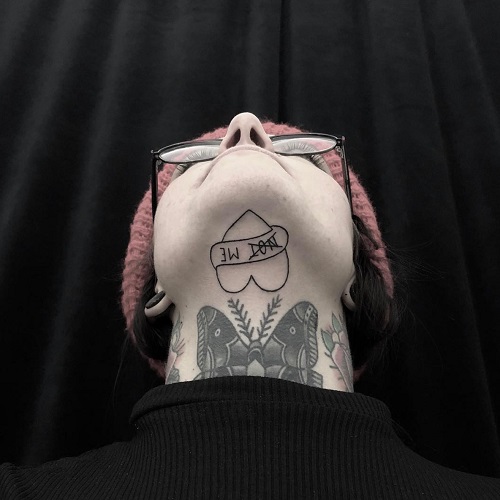 Stunning Under Chin Tattoo