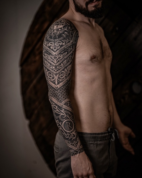intricate sleeve tattoo