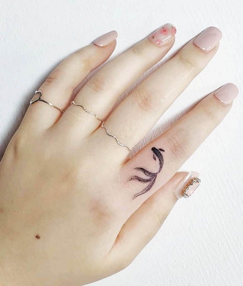 Stunning Tiny Finger Tattoo 4
