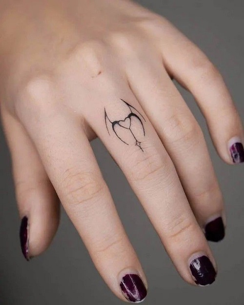 Stunning Tiny Finger Tattoo 5