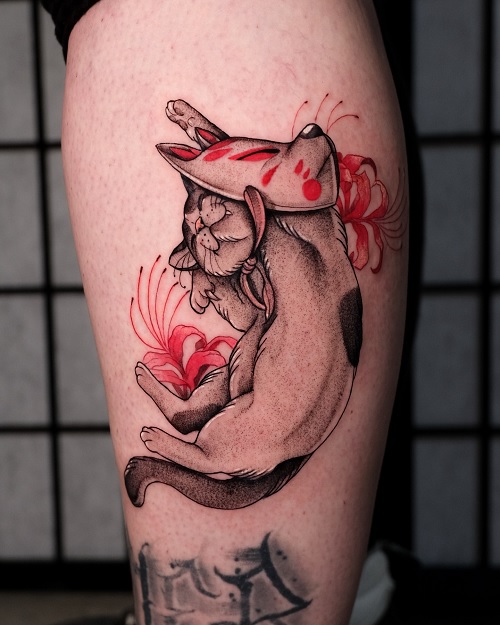cat wearing a mask tattoo