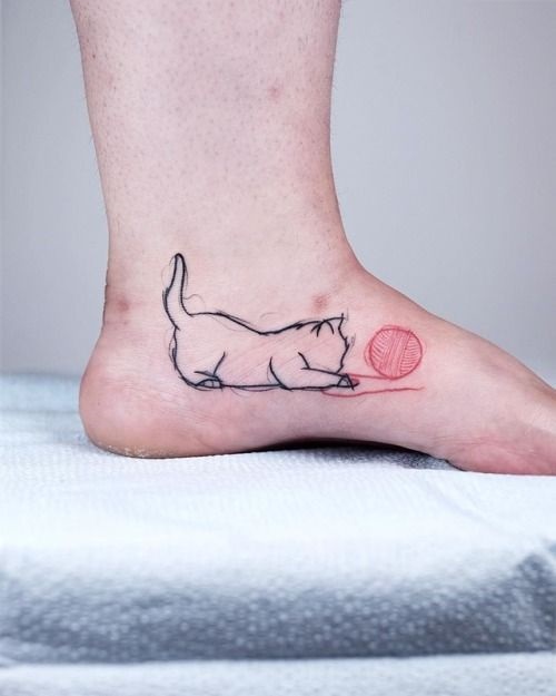 linework cat tattoo 1