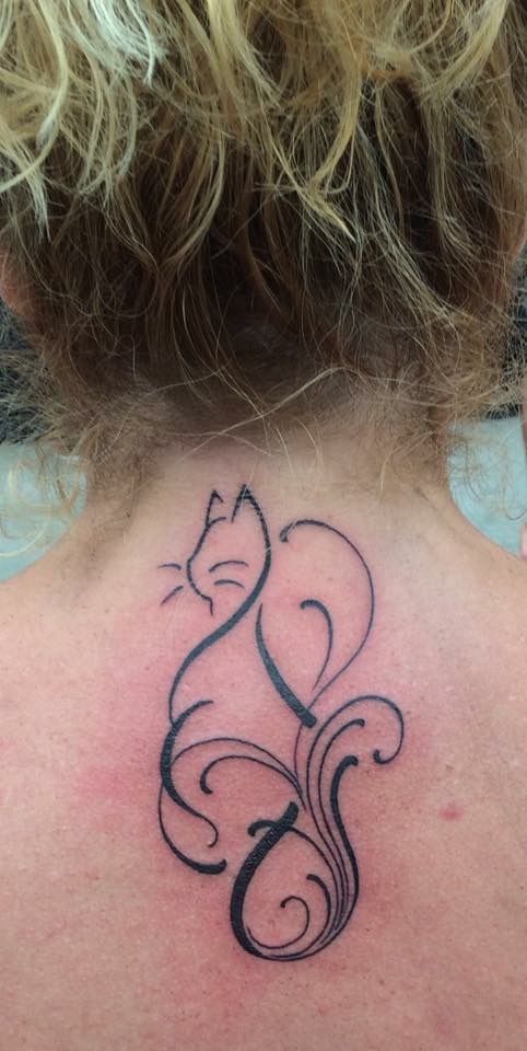 Trending linework cat tattoo 1