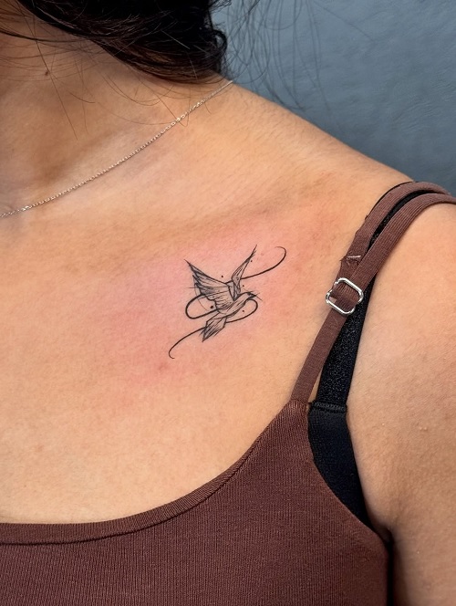 bird flying tattoo
