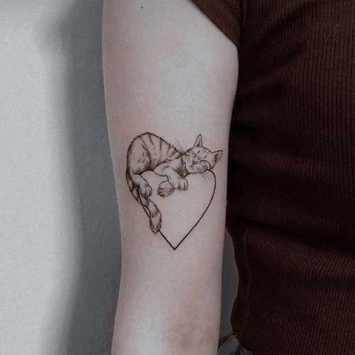 Adorable Sleeping Cat Tattoo 2