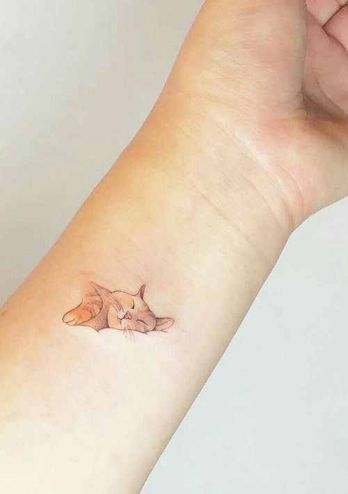 Adorable Sleeping Cat Tattoo 6