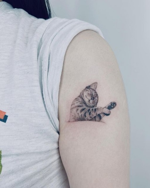 Adorable Sleeping Cat Tattoo 7
