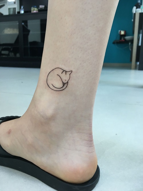 Small Sleeping Cat Tattoo 6