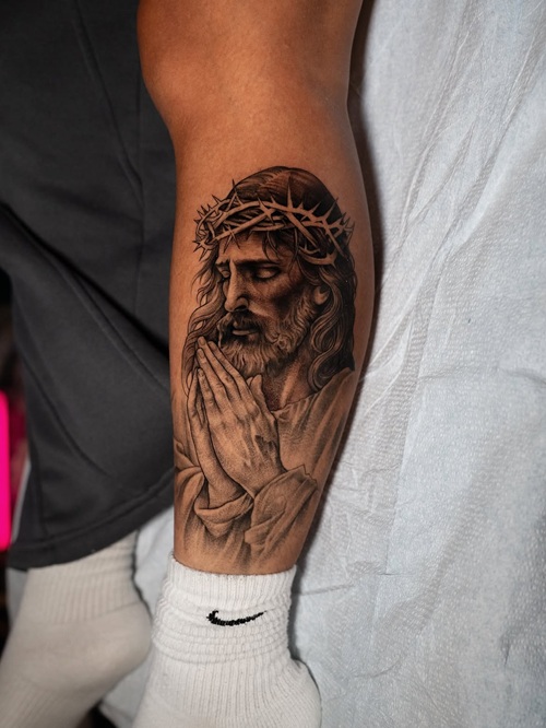 Jesus-Themed Tattoo