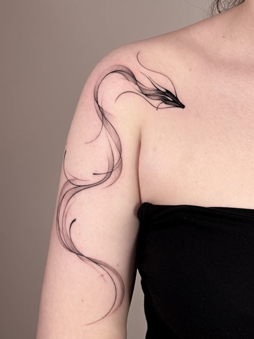 Dragon blackwork tattoo