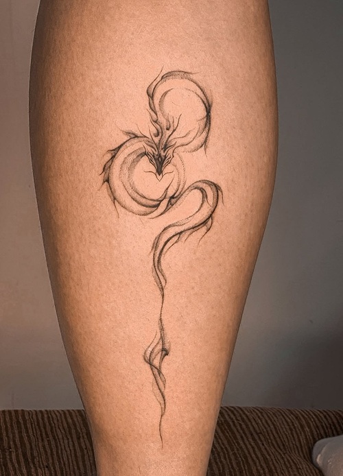 Dragon blackwork tattoo