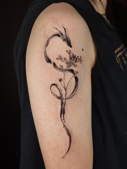 Dragon blackwork tattoo