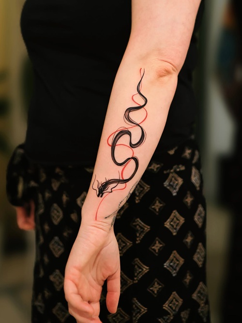 Modern abstract dragon tattoo