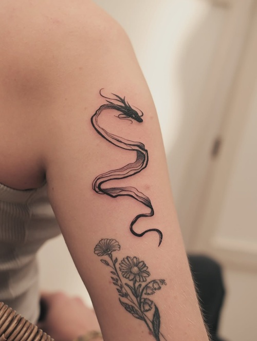 Creative dragon tattoo idea