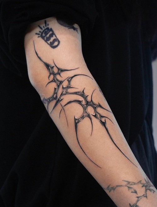Intricate cyber-folk blackwork tattoo