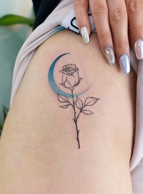 Rose and moon tattoo