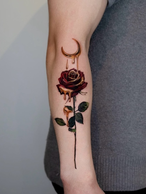 Rose and crescent tattoo