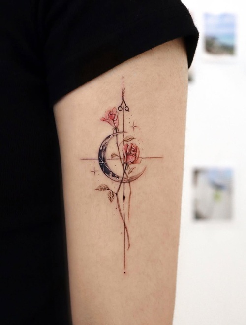 Floral crescent tattoo