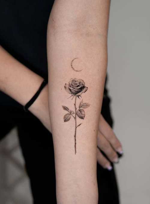 Floral moon tattoo