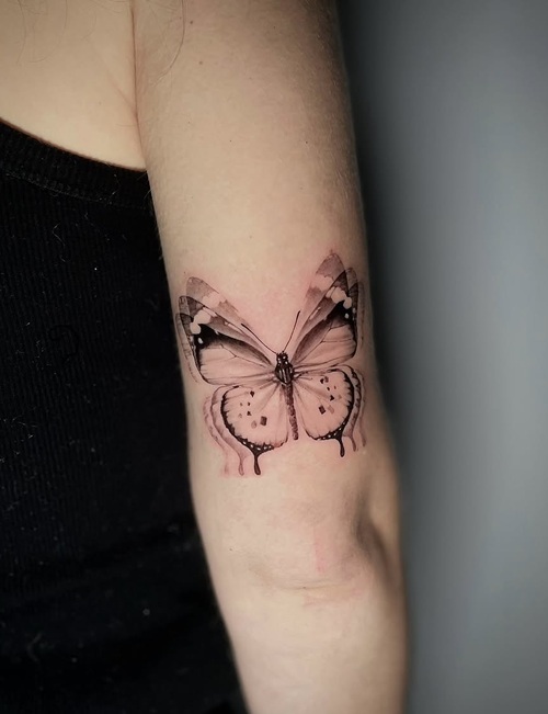 Delicate realistic tattoo