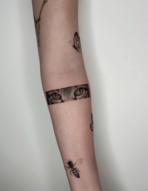 Tiny realistic tattoo
