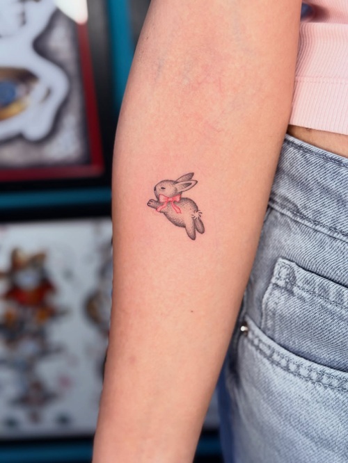 Tiny animal tattoo