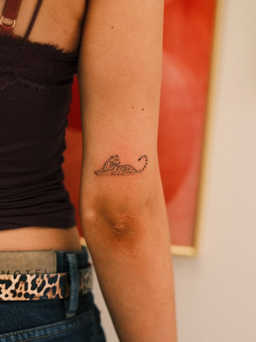 Tiny animal tattoo