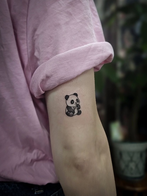 Tiny animal tattoo