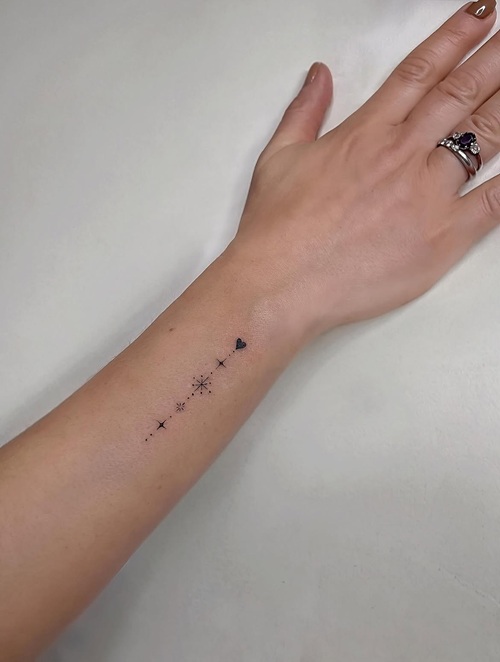 Fine line wrist tattoo