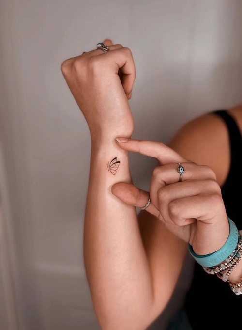Delicate wrist tattoo