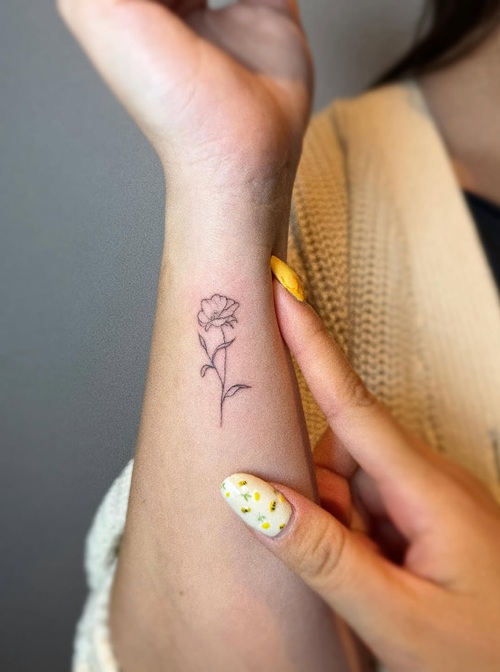 Minimalist wrist tattoo
