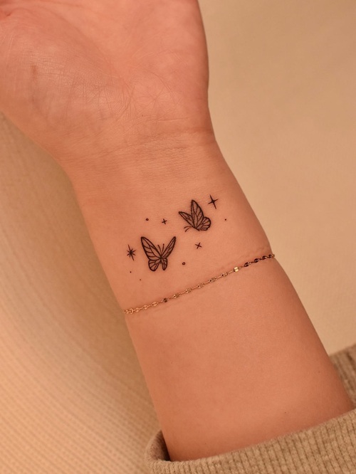 Minimal wrist tattoo design