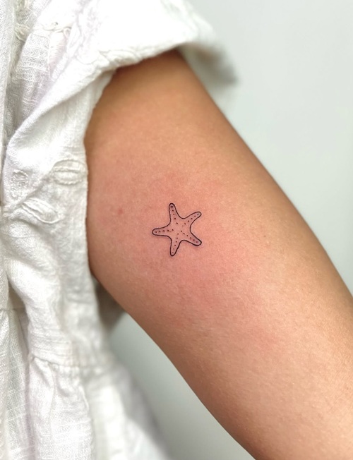 Tiny aquatic animal tattoo
