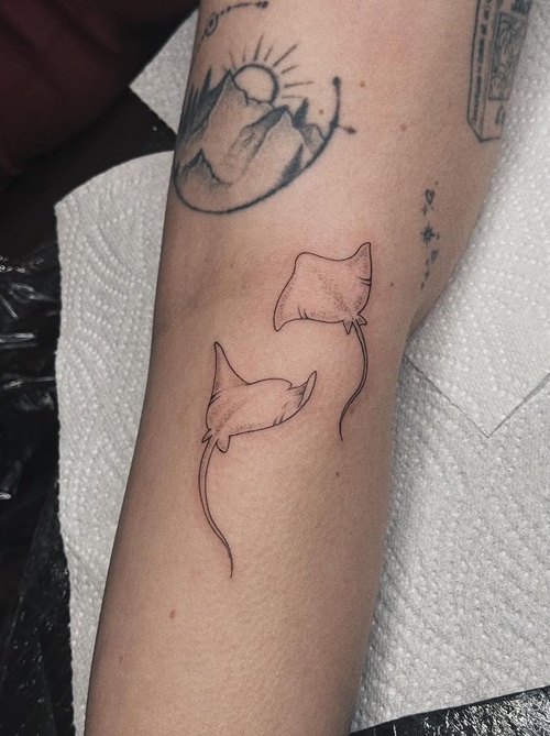 Tiny ocean animal tattoo
