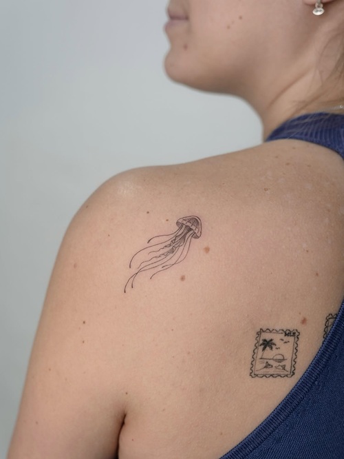 Small aquatic tattoo